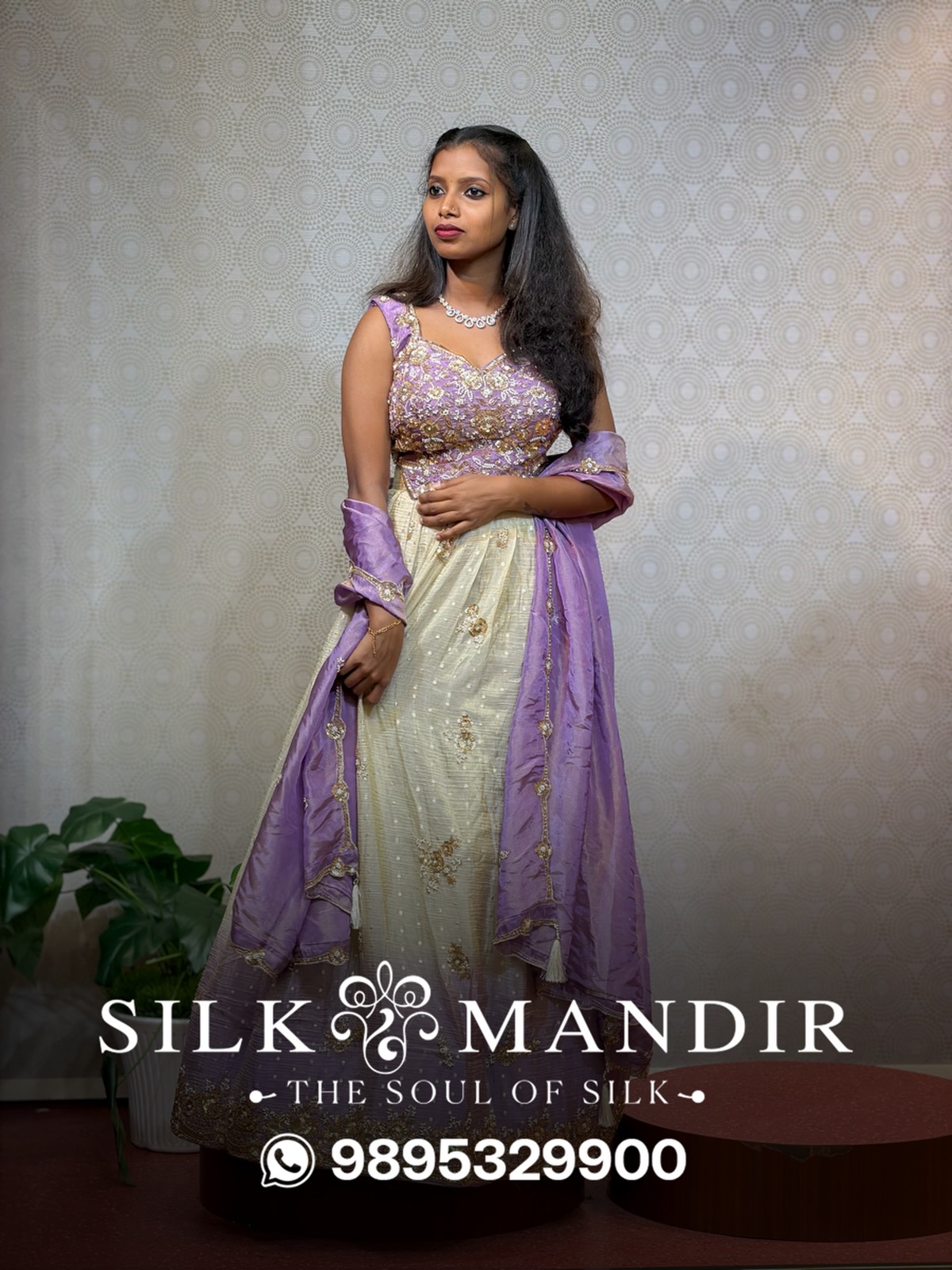 A bride-to-be in lavender and ivory half-saree with gold embroidery
