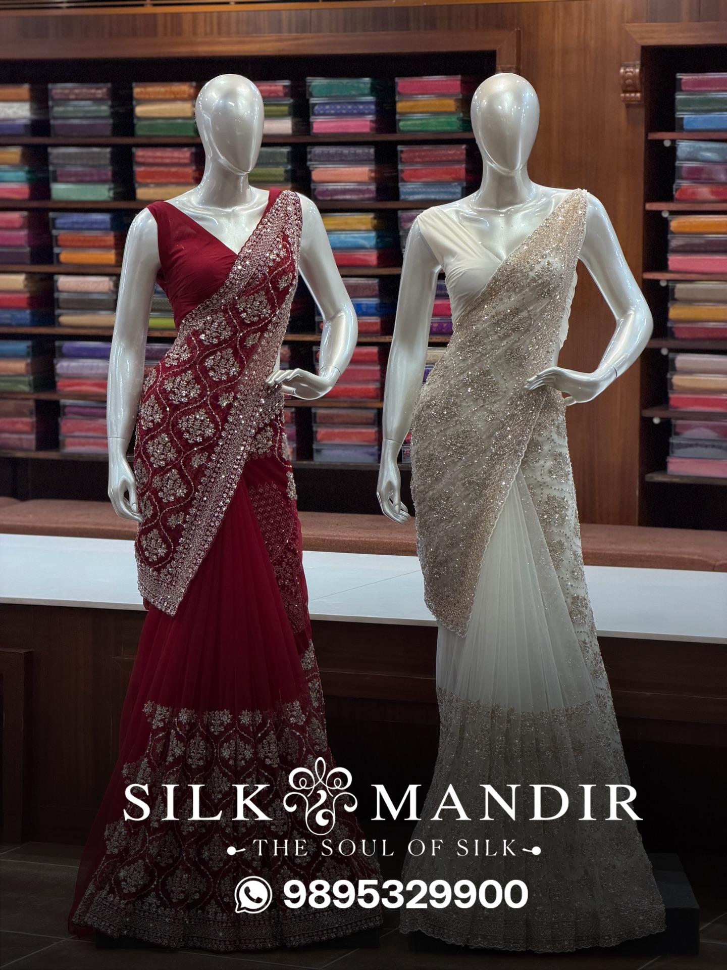 Twin bridal mannequins in red and ivory beaded sarees