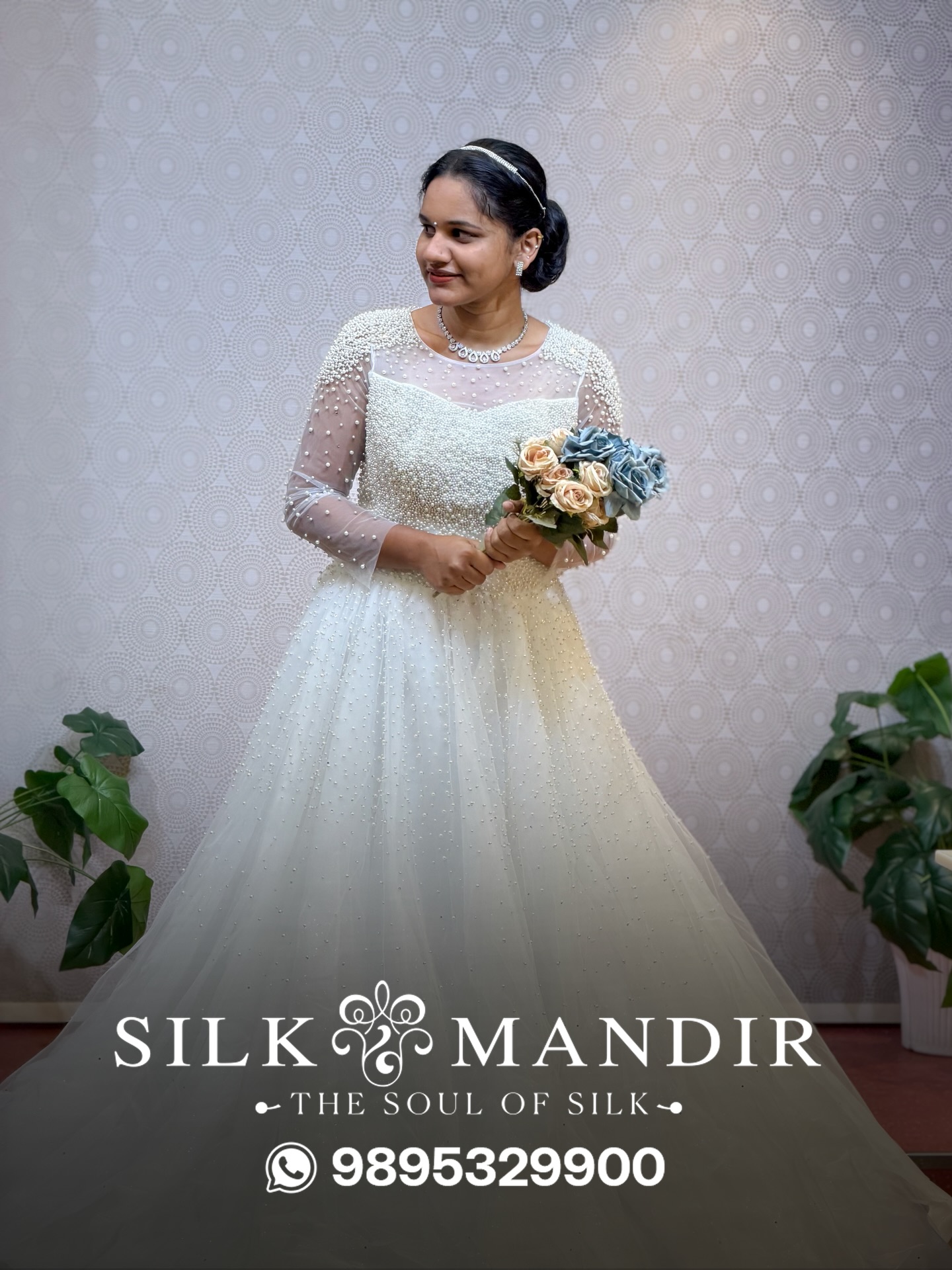 Bride in pearl-beaded white wedding gown